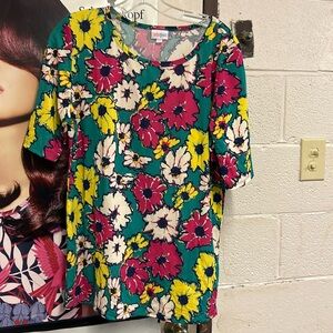 Lularoe short sleeve blouse multi colored floral print 96% polyester 4% spandex